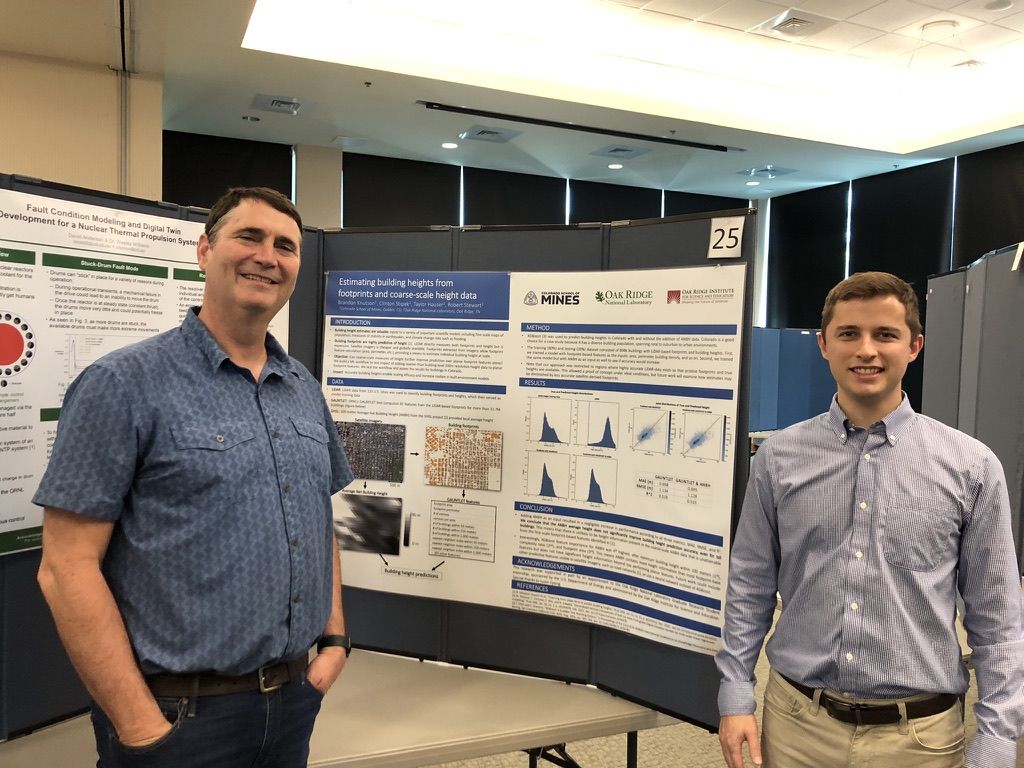 With my mentor Robert Stewart beside our poster at the ORNL intern symposium